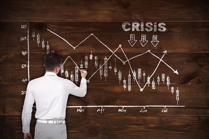 businessman drawin crisis chart on brown wooden wall